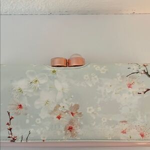 Ted Baker Cream Clutch with Elegant Design